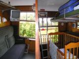 The sitting room and bunk bed with cot on request
