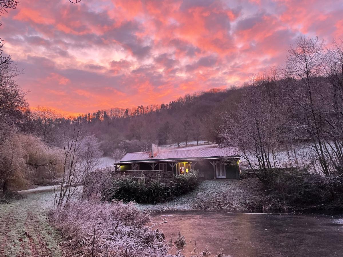 The Lake House The Lake House with sunset sky