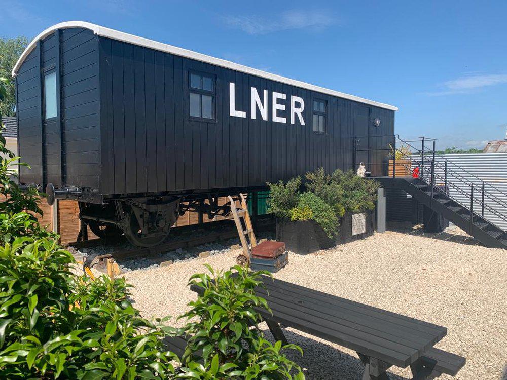 Outside view of wagon with picnic bench 