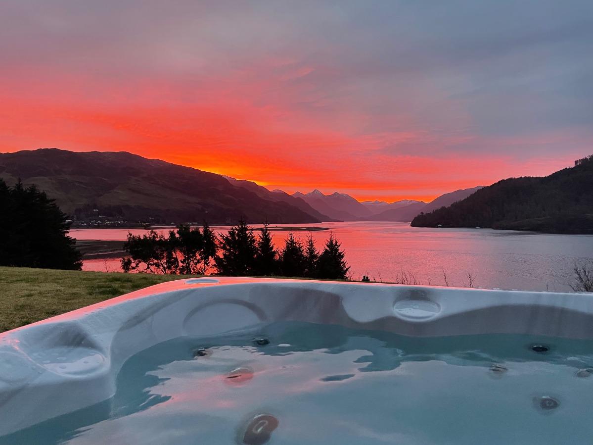 Stunning sunset views over the loch from the hot tub